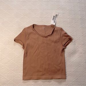 Urban Outfitters cropped ribbed baby t in a nude tan color!
